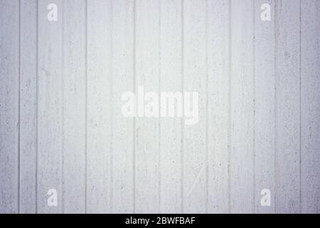 The texture of the profiled sheet is white, a metal fence. For the roof. Aluminum fence. Galvanized steel wall plate. Corrugated metal profiled panels Stock Photo