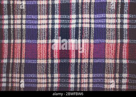 Pattern in black, red and blue cage. Seamless fabric texture. Striped check grunge seamless pattern. Geometric background with black tapestry vertical Stock Photo