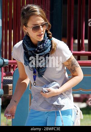 Jessica Alba shows off her new tattoo as she takes Honor and Haven to the park, Beverly Hills, CA. 2 April 2012 Stock Photo