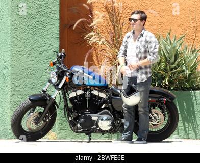 Josh Hutcherson star of The Hunger Games leaves a British pub on his motorbike in Sherman Oaks, California after watching England beat Ukraine 1-0 in the Euro 2012 tournament. 19 June 2012 Stock Photo