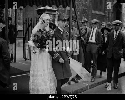 Naval Officer 's wedding . Lt Geoffrey Wells , RN , of HMS Royal Sovereign , son of Sir William and Lady Wells and Miss I B Williams were married at St Michael ' s Church , Chester Square , London . The Bride and Bridegroom . 14 September 1923 Stock Photo
