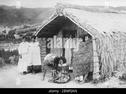 Maoris rubbing noses (Te Hongi) 1891. Two Maori girls greet each other ...