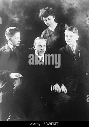 The New American President By death of Mr harding , Mr Calvin Coolidge , the Vice President , automatically becomes President . Mr CAlvin Coolidge with his wife and sons John Coolidge ( left ) and Calvin Coolidge Junior 3 August 1923 Stock Photo