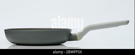 Gray fry pan side view isolated on white background Stock Photo