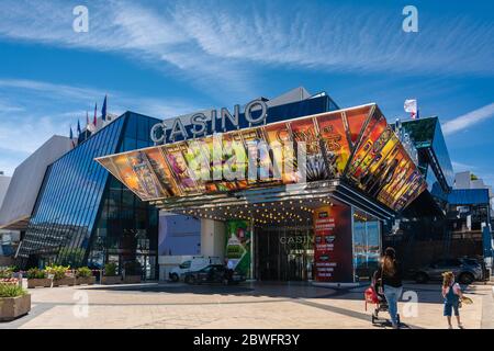 Cannes, France - June 12, 2019 : Colorful facade with advertising of Casino Barriere Le Croisette located in the Palais des Festivals et des Congres i Stock Photo