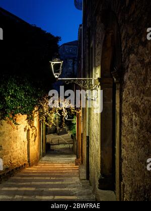 a narrow street in a small sicilian town named piazza armerina Stock Photo