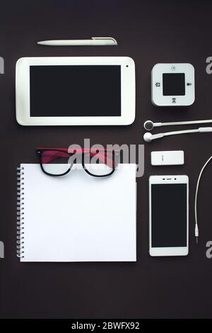 Set of white stationery elements on vintage brown background. Branding template Photo of blank stationery. Mock-up for your design Stock Photo