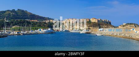 Tropea, Italy - September 9, 2019: Panorama of yacht port of Tropea town. View on port and green mountains  landscape. Porto di Tropea Stock Photo