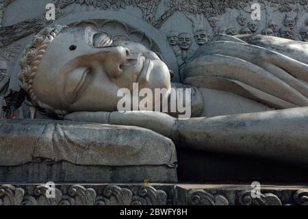 Close view of the reclining Buddha statue at the Long Son Pagoda, Nha Trang, Vietnam Stock Photo