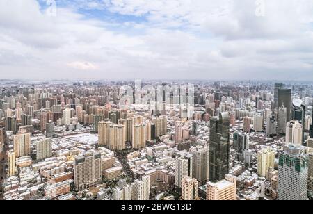 aerial view of downtown Shanghai near Jing An Temple and Nanjin Road after an unusual snowfall in the morning Stock Photo