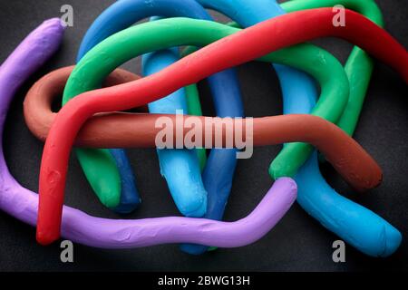 Colorful plasticine lines. Close up. Stock Photo