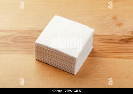 white paper napkins on stylish wooden background Stock Photo