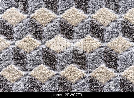 Carpet with beige 3D squares. Background and texture of carpet. Stock Photo