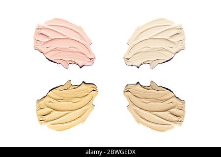 Liquid foundation samples set on white. Stock Photo