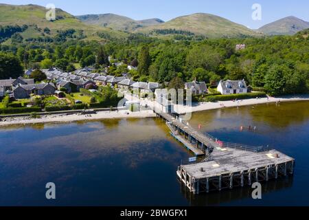 Aerial view of popular tourist village of Luss beside Loch Lomond in Argyll and Bute, Scotland, UK Stock Photo