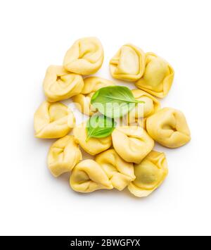 Tortellini pasta. Italian stuffed pasta isolated on white background. Stock Photo