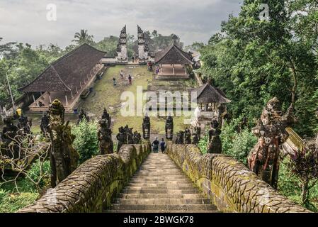 BALI, INDONESIA - JANUARY 12, 2018: Tourists in the Pura Lempuyang temple on Bali, Indonesia Stock Photo