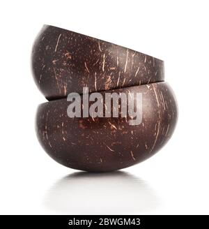 Bowls made from coconut shell isolated on white background Stock Photo