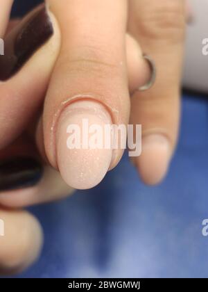 Beauty salon. Perfect nails manicure process. Hardware manicure Stock Photo