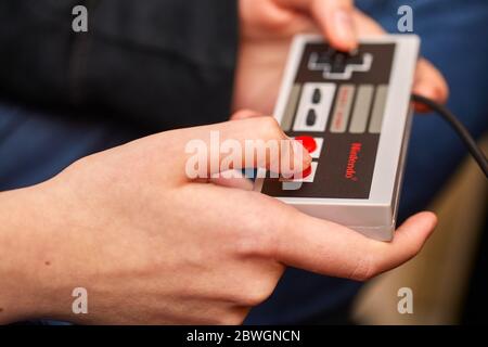 Nintengo NES,playing Super Mario 3 Stock Photo