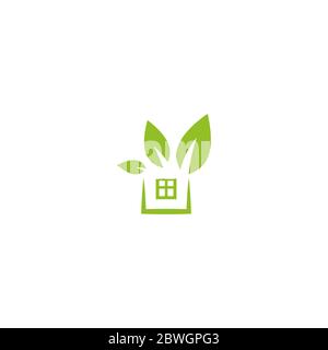 Flat green home with green leaf inside. Simple silhouette of the house with green roof and chimney. Icon isolated on white. Vector building symbol. Ec Stock Vector