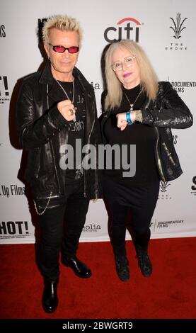 April 5, 2017, Los Angeles, California, USA: Billy Idol and Penelope Spheeris arrive for the Premiere Of 'SHOT! The Psycho-Spiritual Mantra of Rock' held at Pacific Theatres  in Los Angeles, California at The Grove on April 5, 2017. (Credit Image: © Billy Bennight/ZUMA Wire) Stock Photo