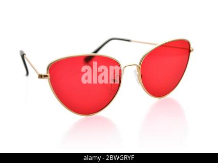 Sunglasses with metal frame, cat's eye shape, red lenses, isolated on white background with clipping path Stock Photo