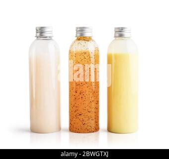Three bottles with metal cover isolated on white background, clipping path included Stock Photo