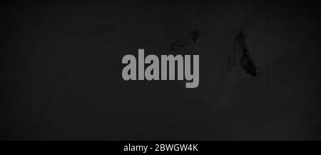 Panoramic black wall surface, dark wall texture Stock Photo