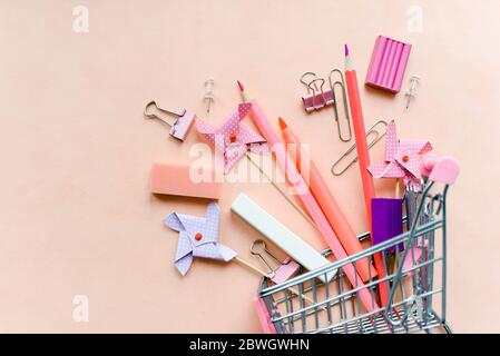 Stylish stationery on pink background. School stationery or office supplies.  Workplace organization. Concept back to school. Stock Photo