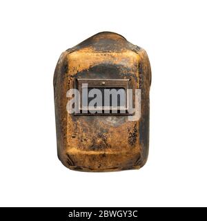 Aged thirty years old welding mask with traces of wear, front view. Isolated on white background with clipping path. Stock Photo