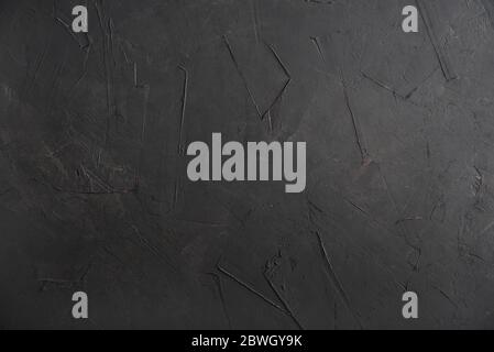 Texture of old black concrete wall for background Stock Photo