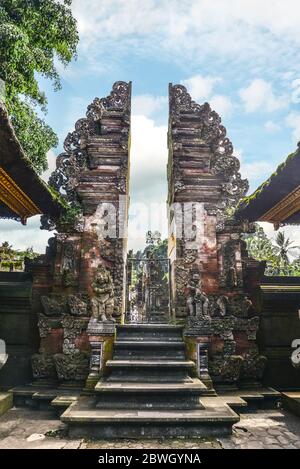 Gate on territory of Holy Spring Water Temple (Pura Tirta Empul) on Bali, Indonesia. Stock Photo