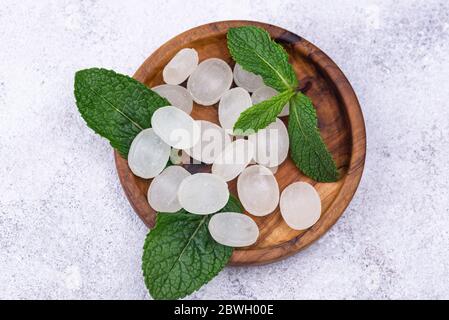 Sweet hard peppermint candy and mint Stock Photo