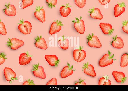 Strawberry slices as seamless pattern on red background Stock Photo