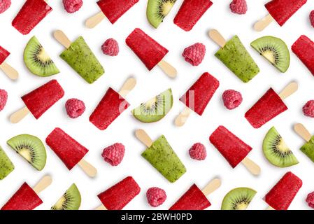 Pattern from raspberry and kiwi popsicle isolated on white background Stock Photo