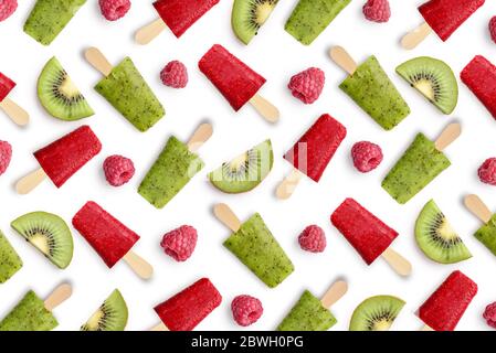 Pattern from raspberry and kiwi popsicle isolated on white background Stock Photo