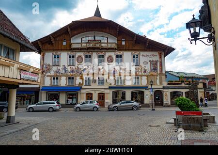 The wonderful and famous painted houses of Oberammergau in Bavaria - OBERAMMERGAU, GERMANY - MAY 27, 2020 Stock Photo