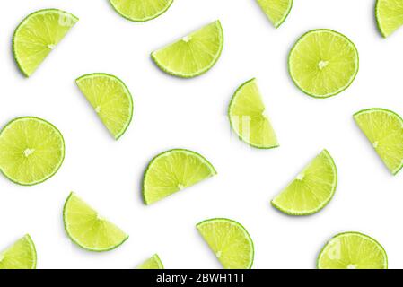 Lime slices as pattern isolated on white background Stock Photo