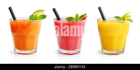 Glasses of papaya, mango and strawberry smoothie isolated on white background. Clipping path included Stock Photo