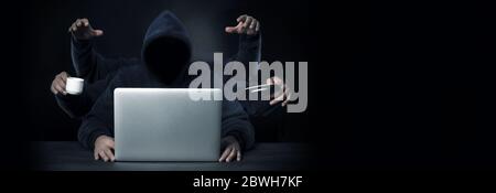 a programmer with six hands all a successful workaholic in the workplace Stock Photo