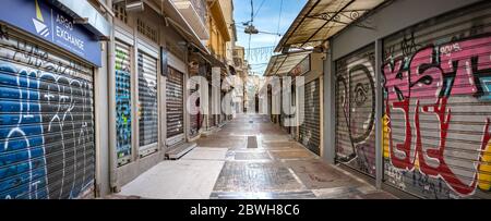 Panoramic view of closed stores at the Pandrossou street market in Plaka, Athens. Stock Photo