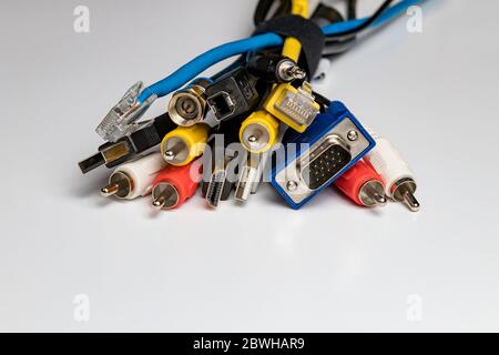 Bundle of electronic, data, computer and internet wires and cables. Concept of cutting the cord, unplugged, wireless, detached. Stock Photo