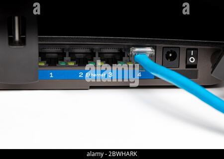 Closeup of wireless router ethernet and internet connection. Concept of internet access, data, e-commerce and e-learning Stock Photo