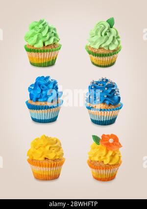 Colorful cupcakes on grey background Stock Photo