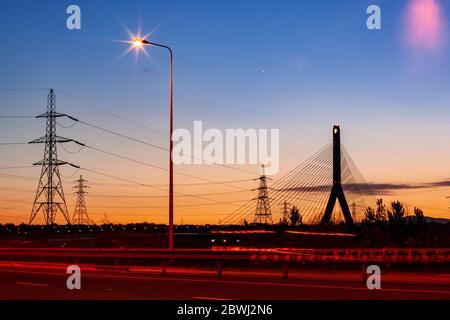 Flintshire suspension bridge at dusk Stock Photo