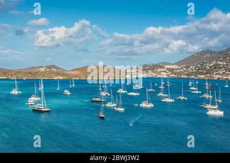 Sailing boats and yachts anchored in the Long Bay marina in Harbor of Charlotte Amalie, St. Thomas, United States Virgin Islands Stock Photo