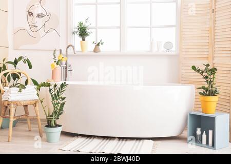 Interior of bathroom with floral decor Stock Photo