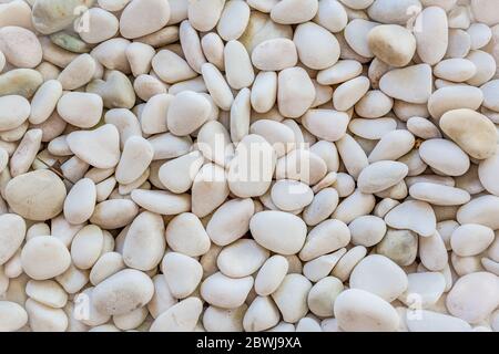 White pebbles stone for background. Natural outdoor texture Stock Photo