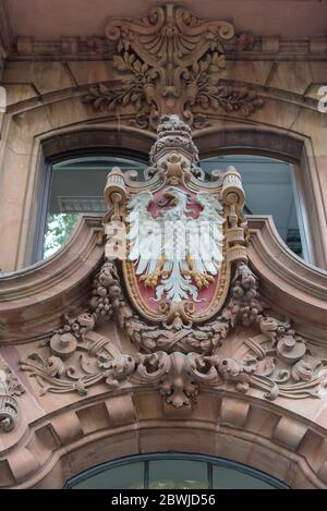 colored sandstone coat of arms above the entrance of a house in Frankfurt, Germany Stock Photo
